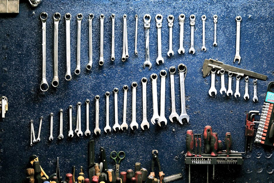 A well-organized garage with tools on pegboards and seasonal items neatly stored