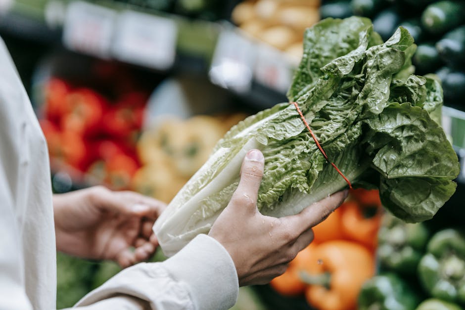 Hands selecting fresh spring produce at a market